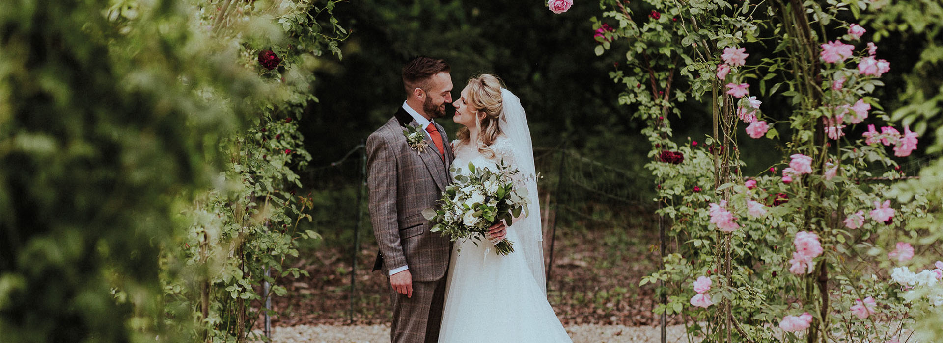 An outdoor image of a newly married couple.